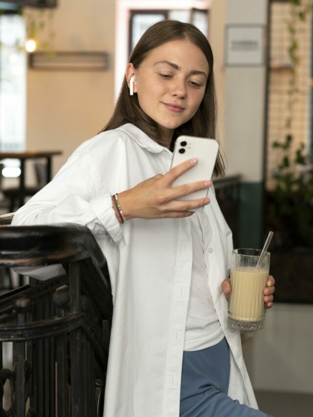 cropped-woman-wearing-earbuds-while-choosing-song-from-her-phone-scaled-1.jpg