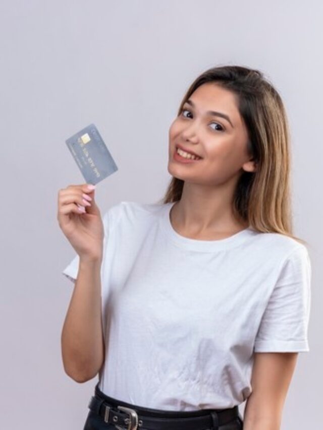 cropped-pretty-young-woman-white-t-shirt-showing-credit-card-white-wall_141793-31406.jpg